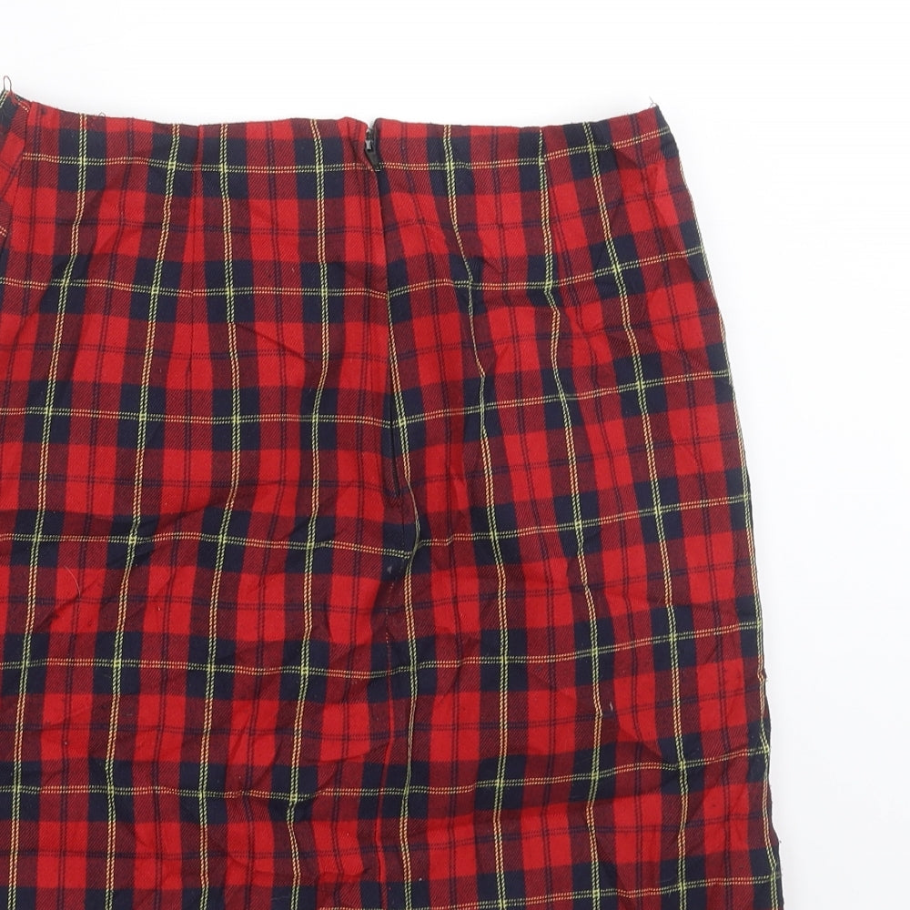 Brand and care label for New Look girls’ red plaid mini set, size 8, years