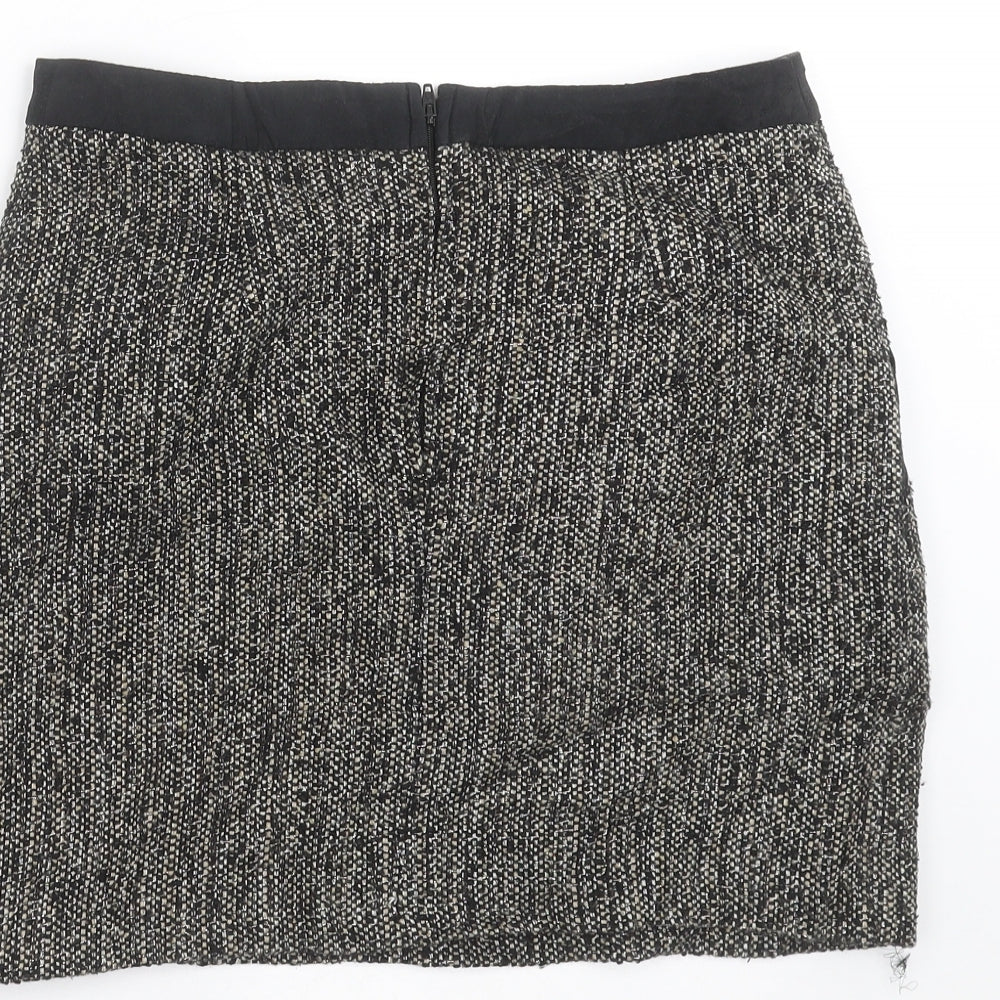 Brand and care label for George women’s black mini skirt, size UK 8