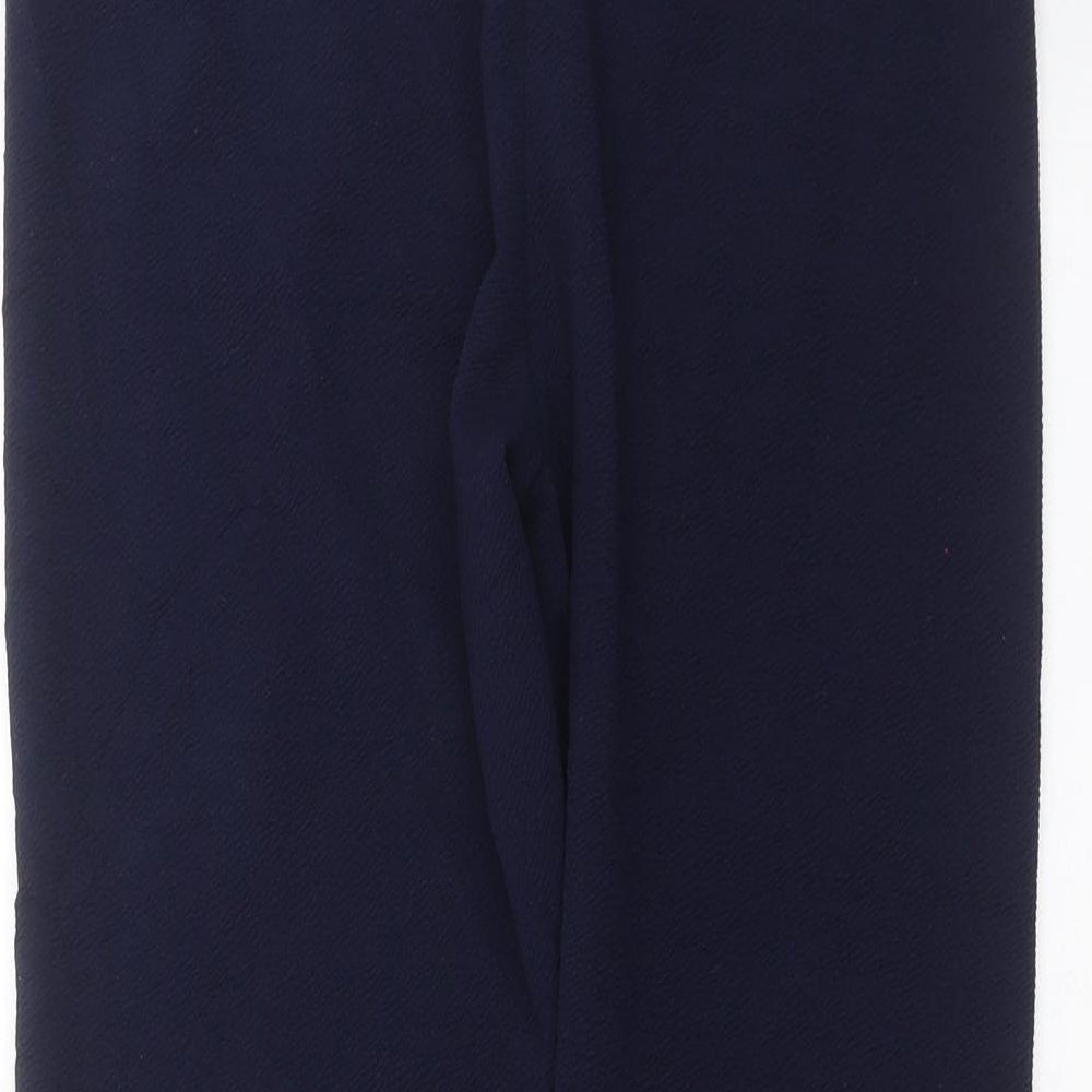 Brand and care label for Originals women’s blue cropped leggings, size M, 22-inch leg