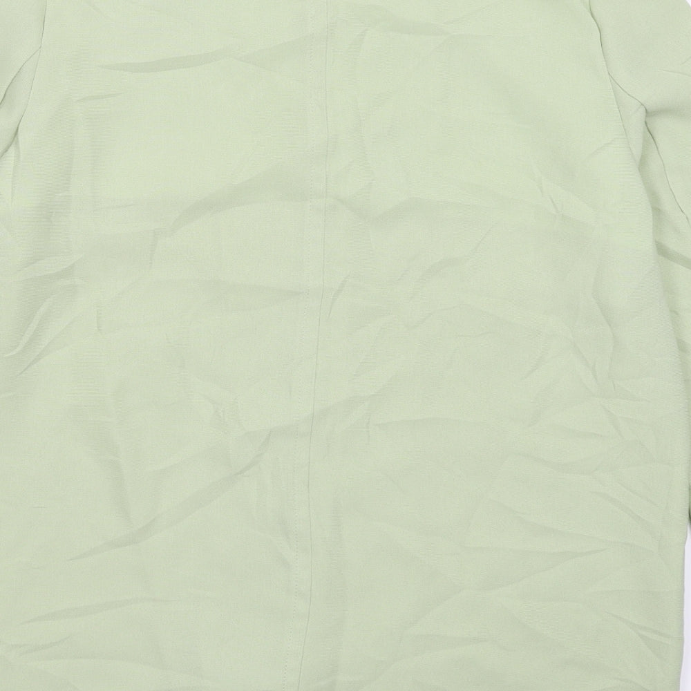 Brand and care label for Compliments women’s green jacket blazer, size UK 14
