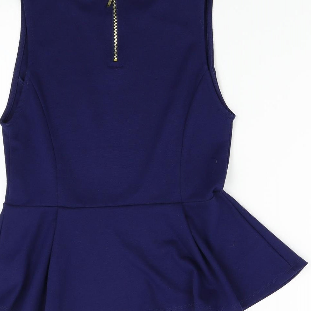 Brand and care label for Forever 21 women’s blue basic tank, size M