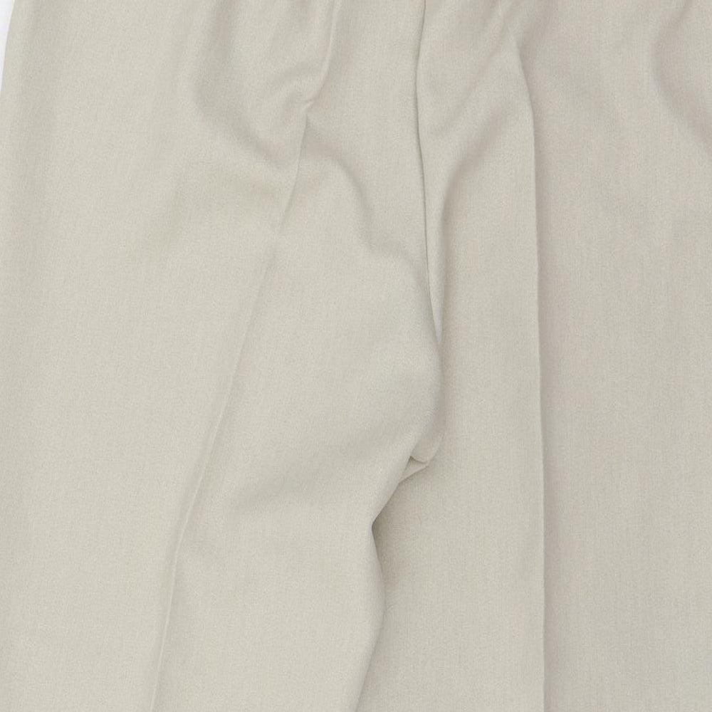 Brand and care label for Saira of Manchester women’s ivory trousers, size UK 27, in, 26-inch leg