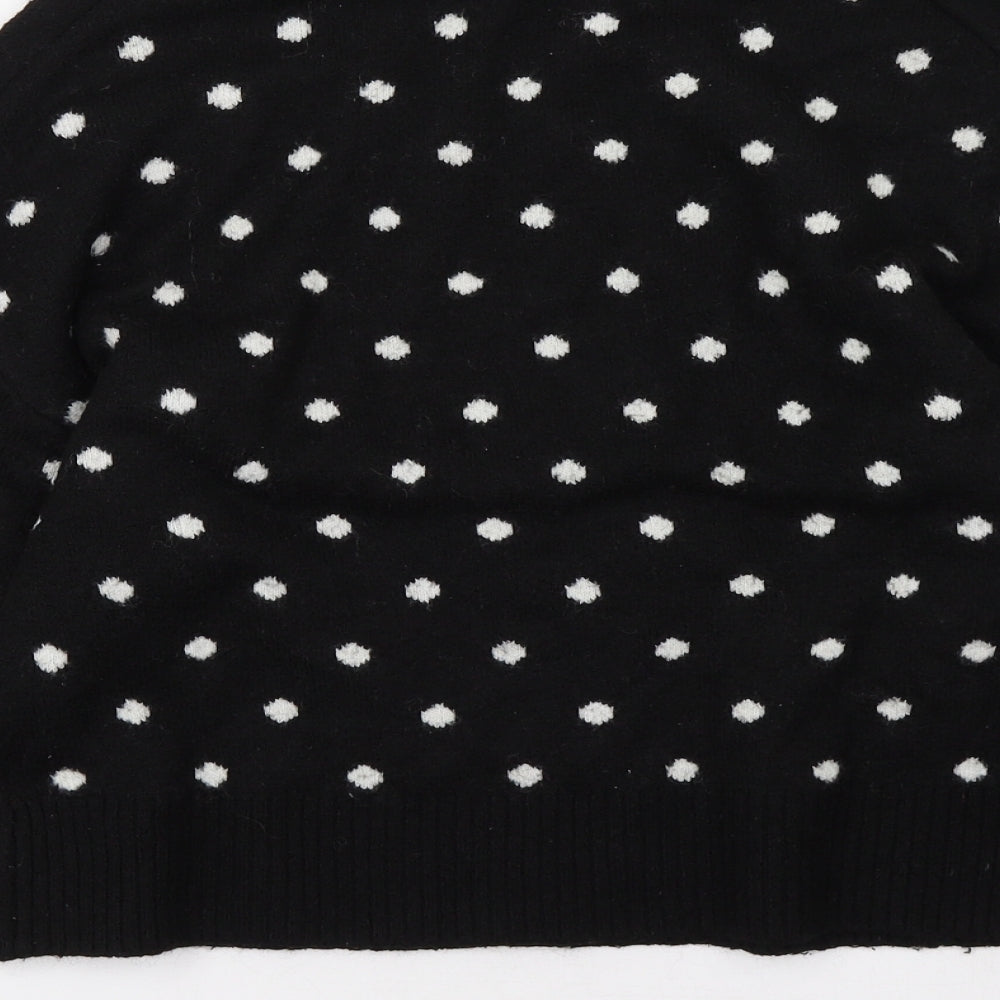 Brand and care label for H&M women’s black polka dot pullover sweatshirt, size S