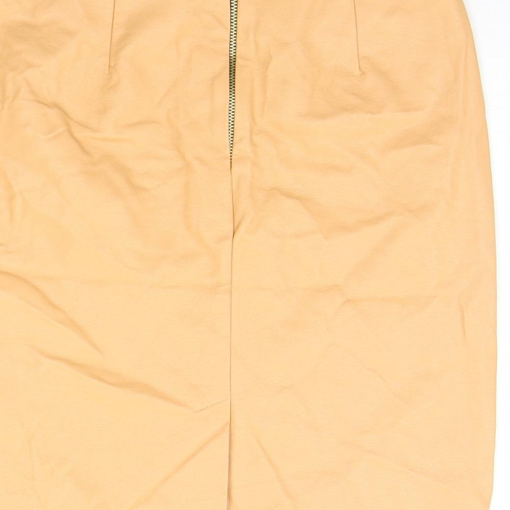 Brand and care label for Atmosphere women’s orange a-line skirt, size UK 8