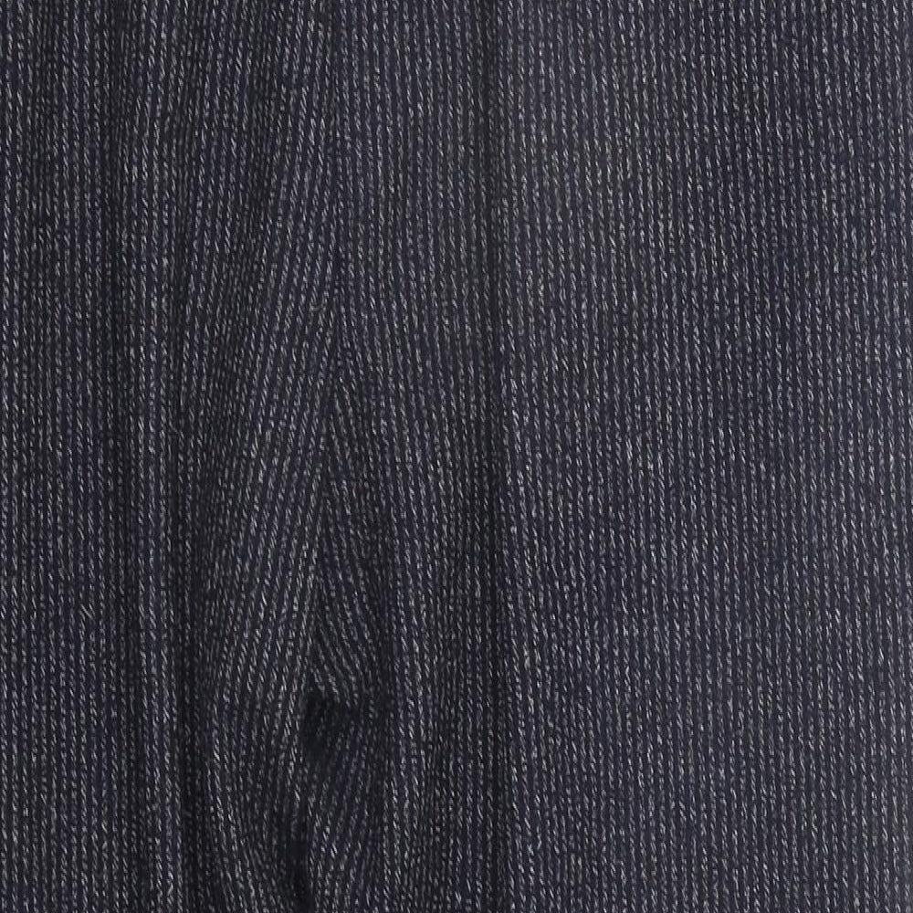 Brand and care label for Marks & Spencer men’s blue striped jogger trousers, size 18, 22-inch leg