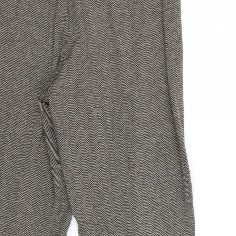 Brand and care label for Bonmarché women’s brown geometric trousers, size UK 16, 28-inch leg