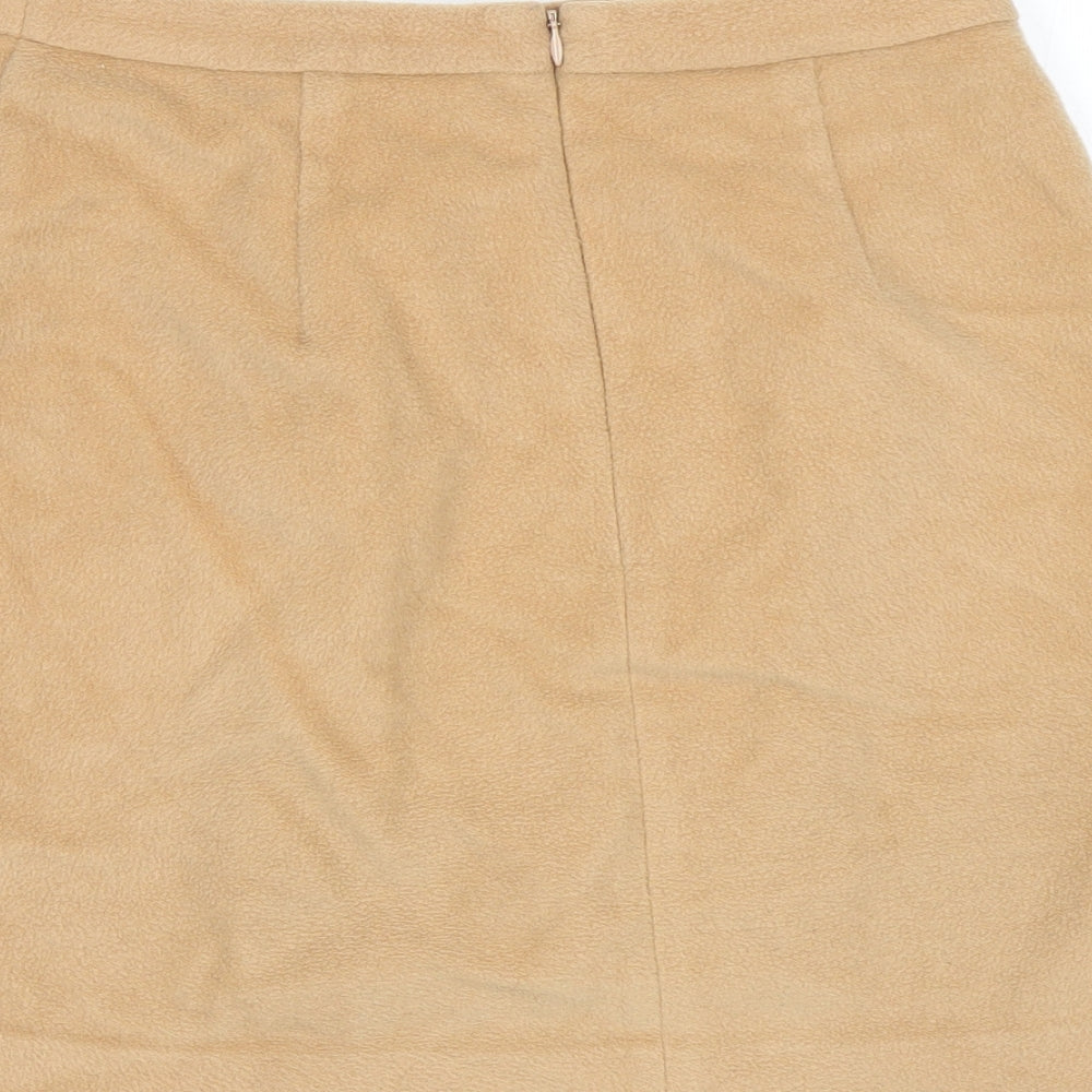 Brand and care label for Marks & Spencer women’s brown mini skirt, size UK 10