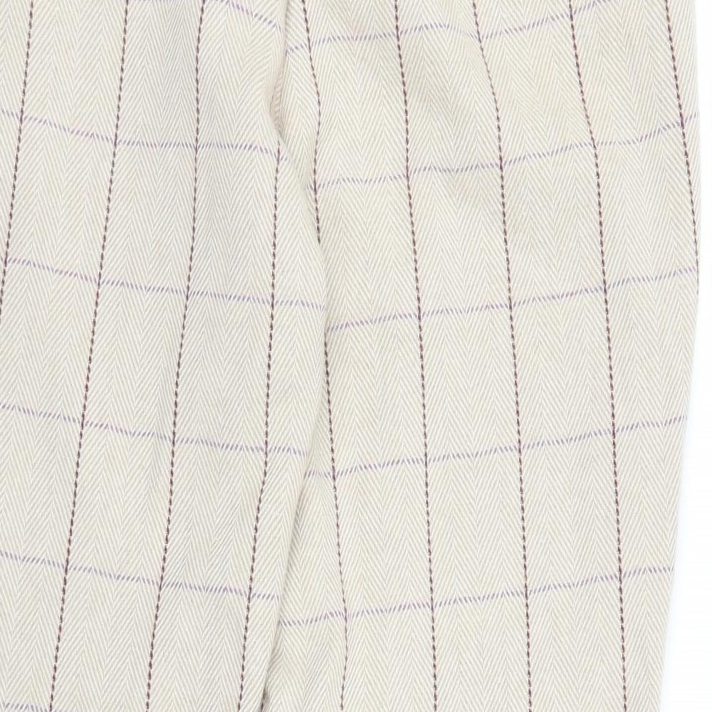 Brand and care label for Cotton Traders women’s beige plaid trousers, size UK 16, 29-inch leg