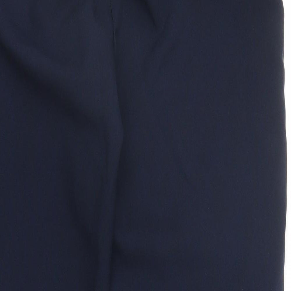 Brand and care label for Preworn boys’ blue carpenter trousers, size 15, years