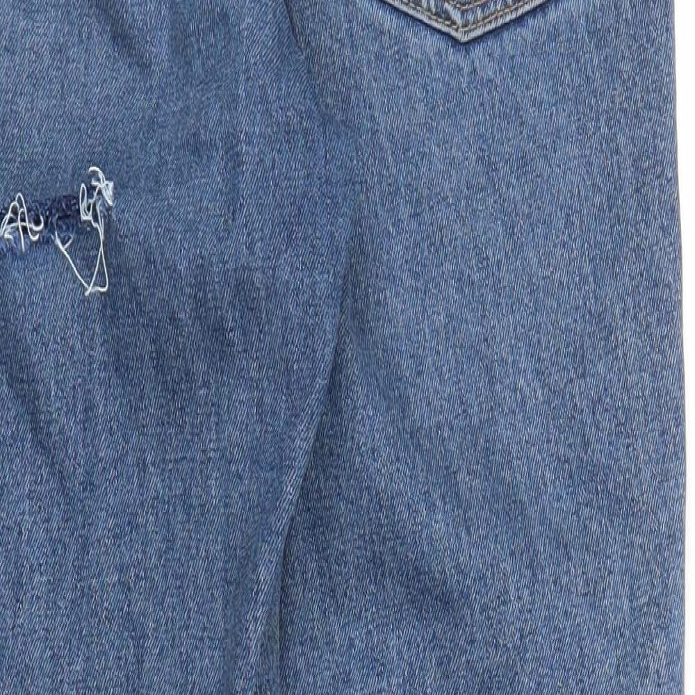 Brand and care label for Topshop women’s blue denim mom jeans, size M, 28-inch leg