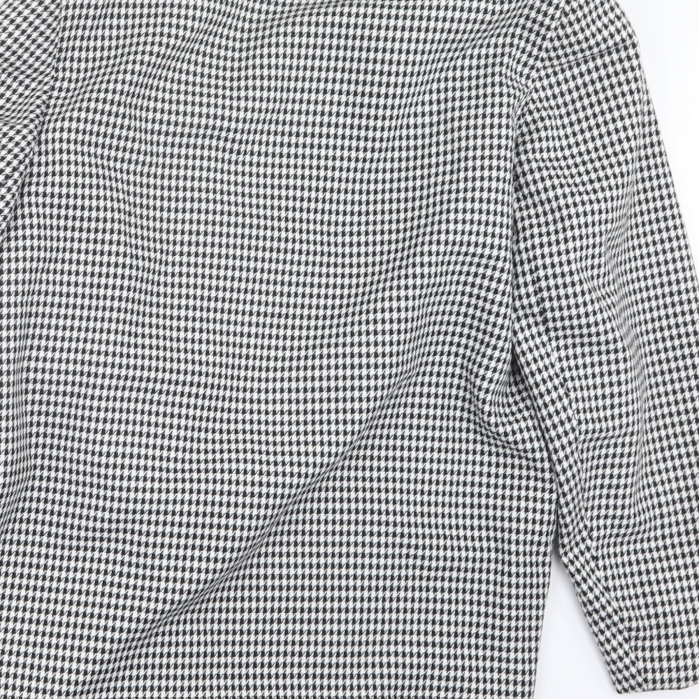 Brand and care label for C&A women’s black houndstooth jacket coat, size UK 14