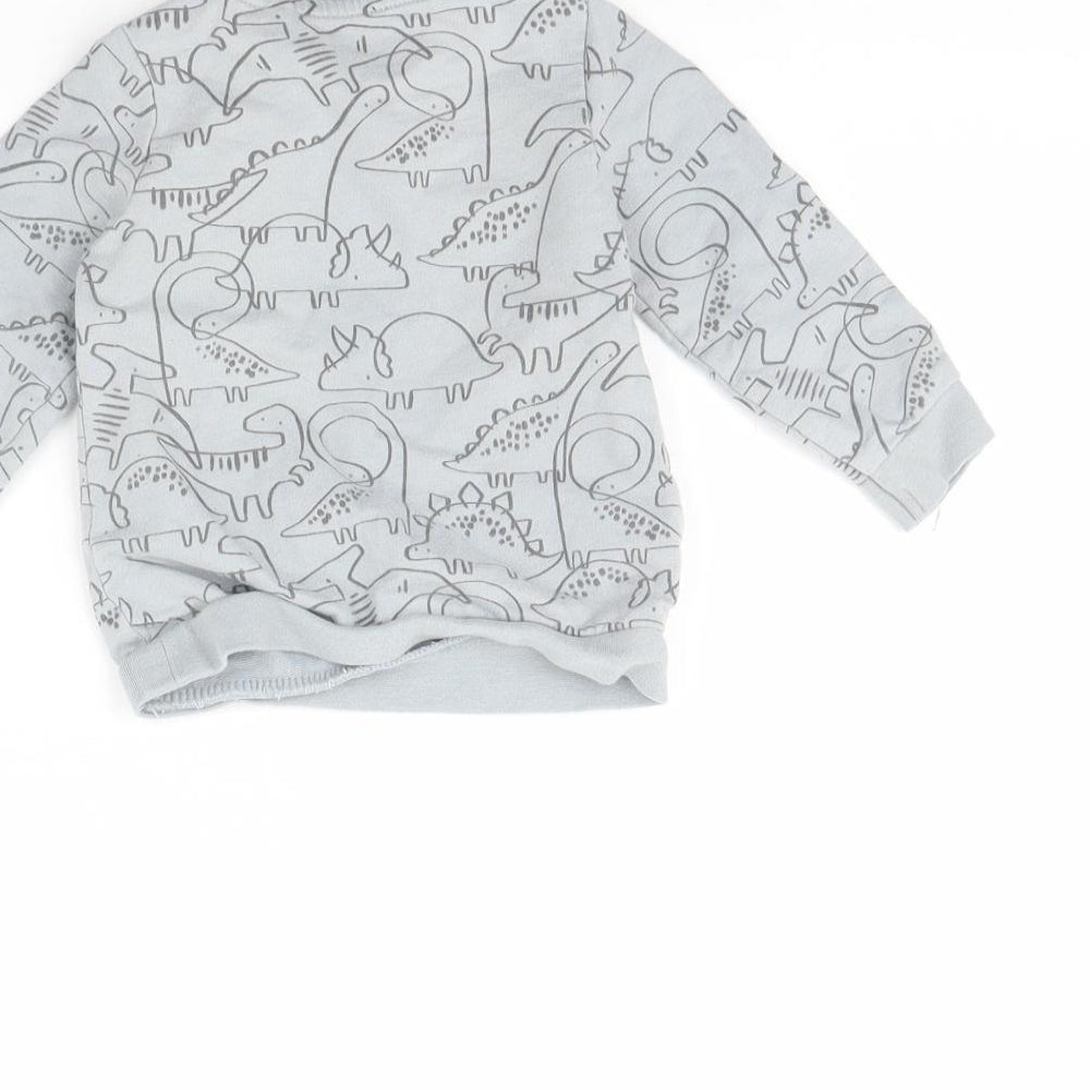 Brand and care label for Tu Baby Grey Animal Print jumper, size 6-9, Months - Dinosaur