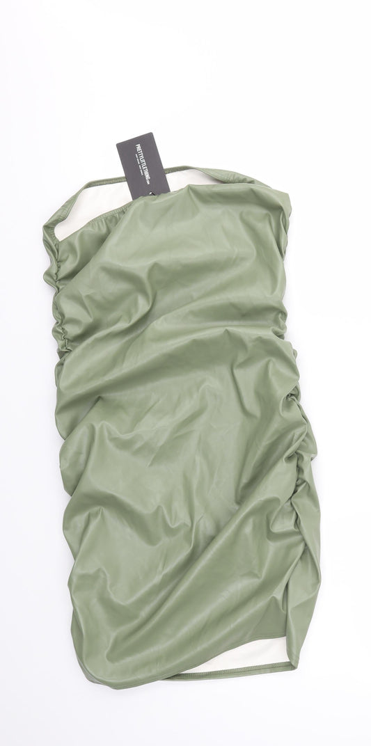 Back view of PRETTYLITTLETHING women’s green fit & flare