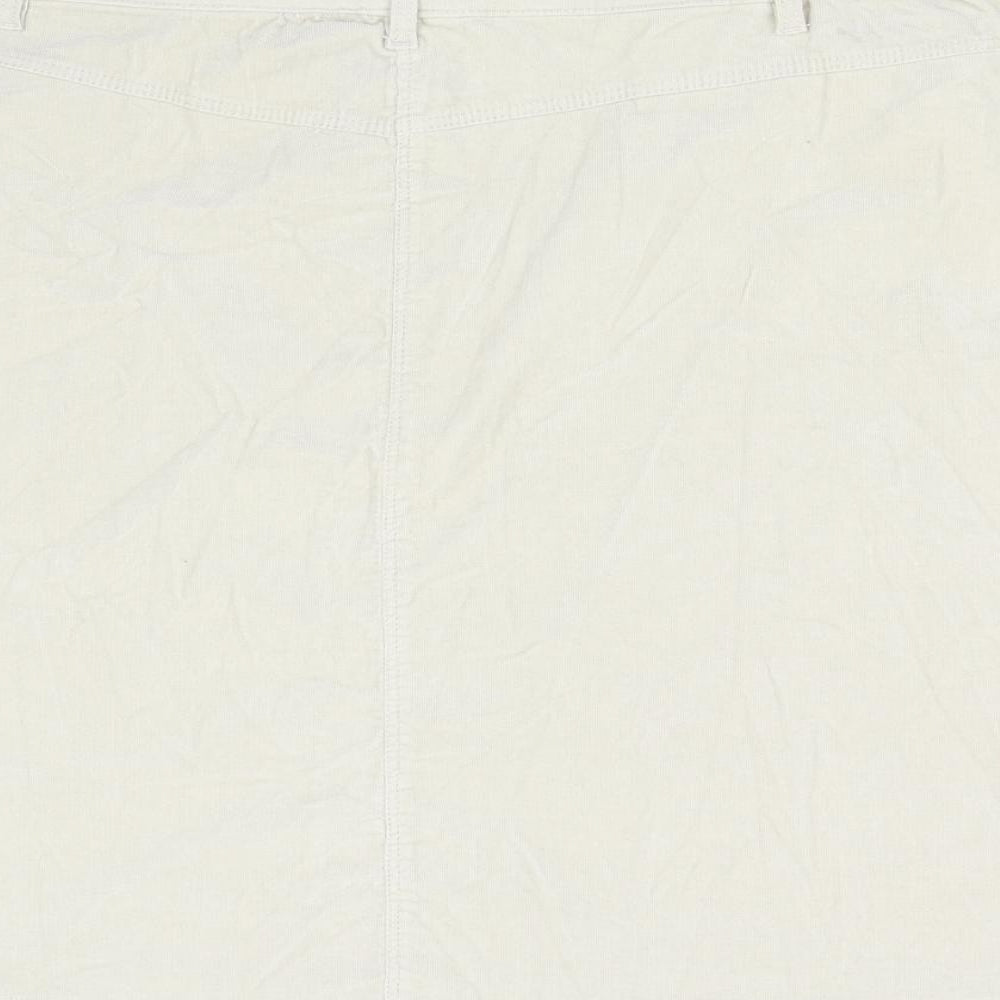 Brand and care label for Anthology women’s beige corduroy mini skirt, size UK 30
