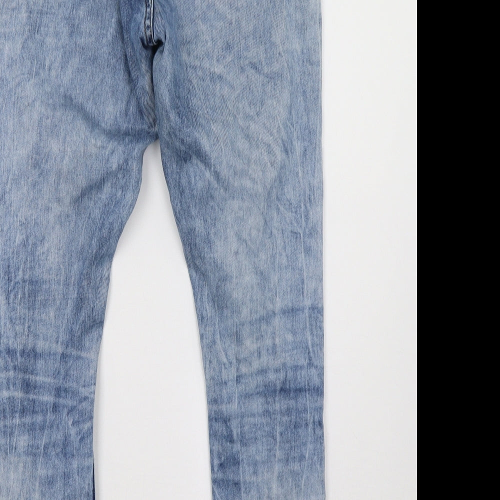Brand and care label for Topshop women’s blue denim skinny jeans, size UK 32, 32-inch leg