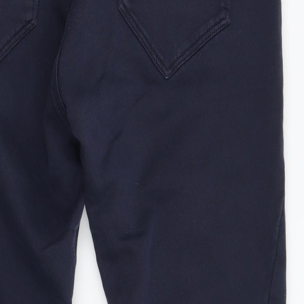 Brand and care label for Dunlop men’s blue trousers, size 27, 24-inch leg