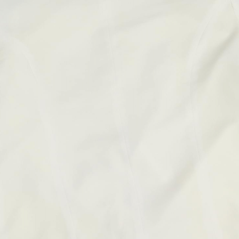 Brand and care label for Missguided women’s ivory jacket, size UK 10