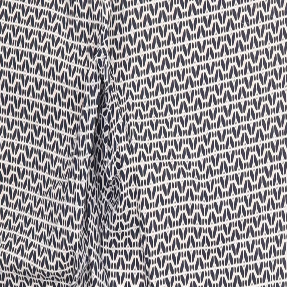 Brand and care label for F&F women’s pink geometric trousers, size UK 10, 27-inch leg