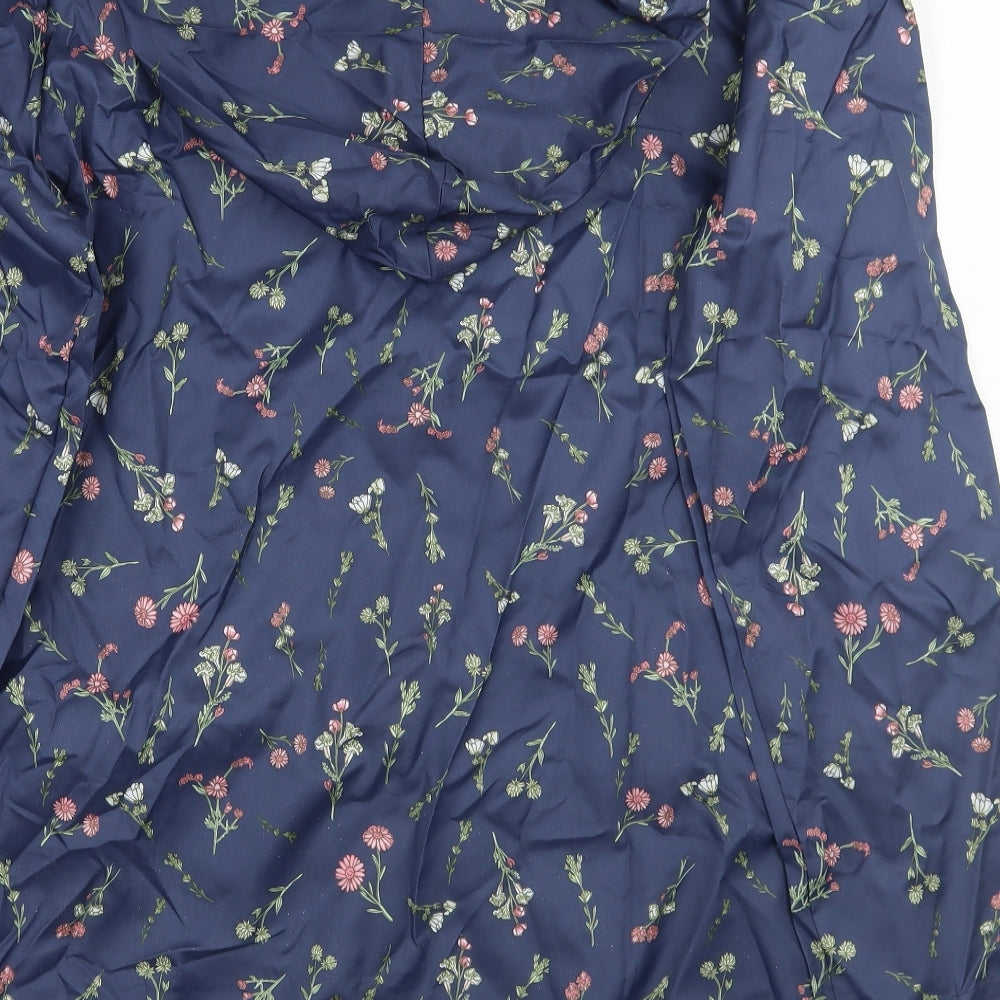 Brand and care label for ann de lancay women’s blue floral jacket coat, size S
