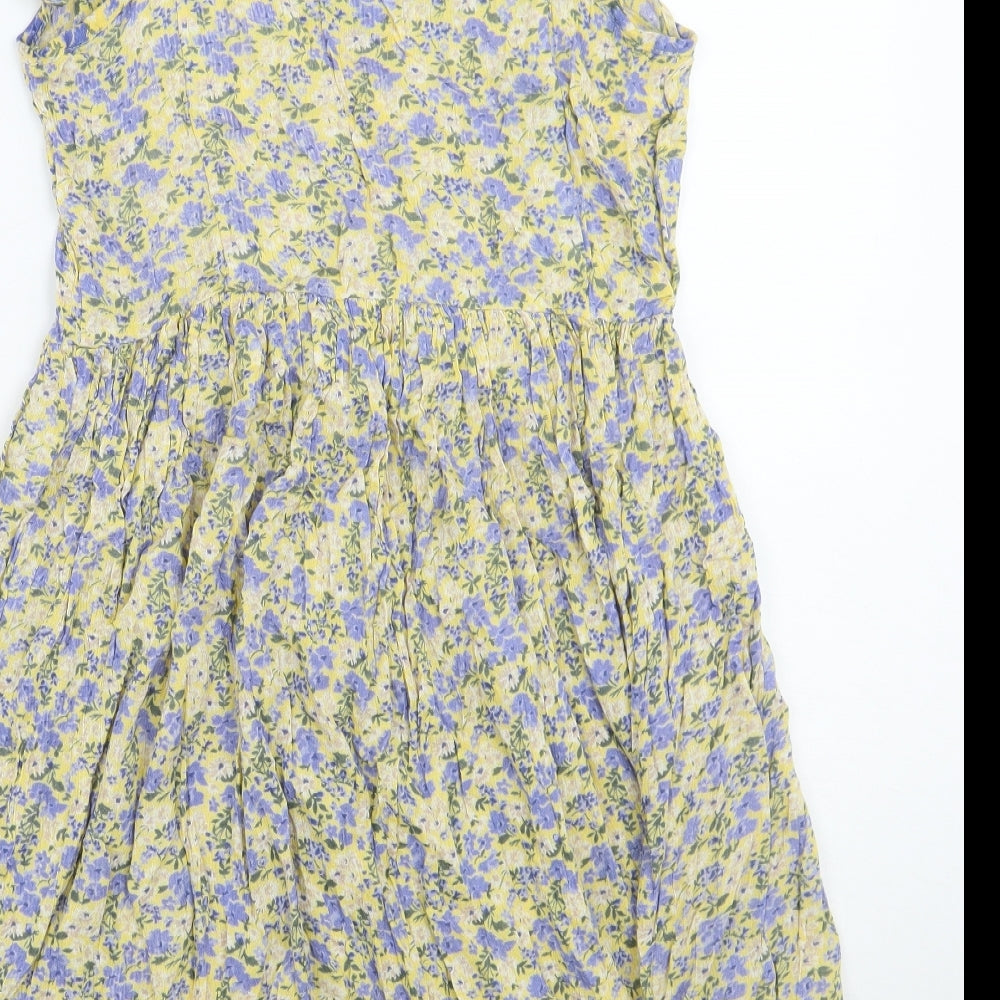 Brand and care label for New Look women’s yellow floral a-line, size UK 6