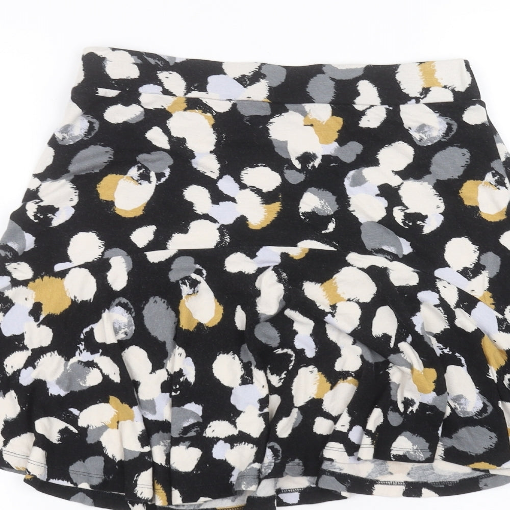 Brand and care label for Next women’s black a-line skirt, size UK 8