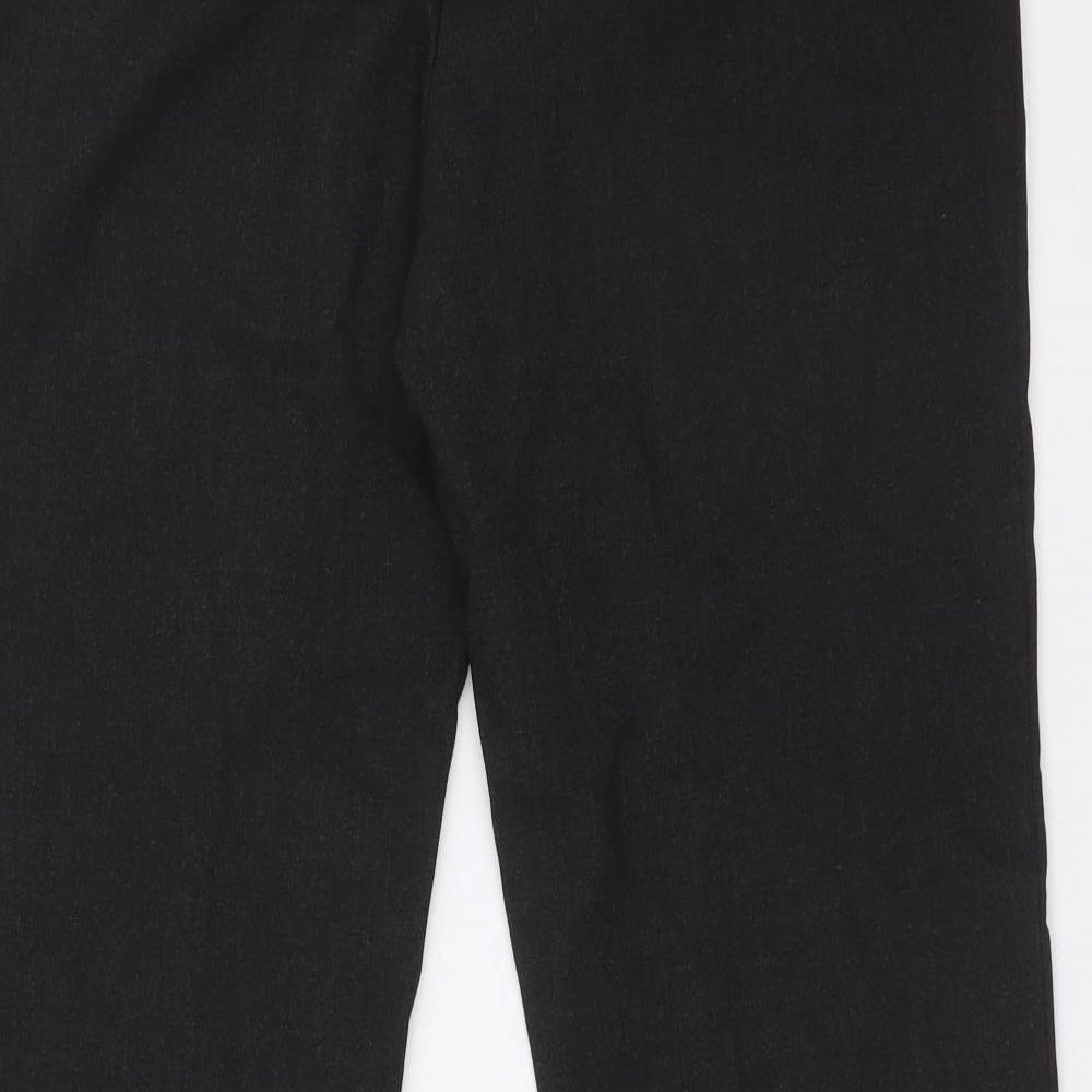 Brand and care label for Marks & Spencer men’s grey trousers, size XS, 29-inch leg