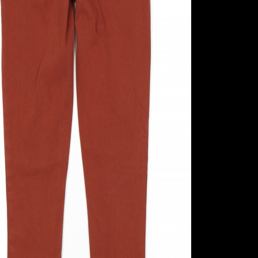 Brand and care label for George women’s orange jegging jeans, size UK 8, 27-inch leg