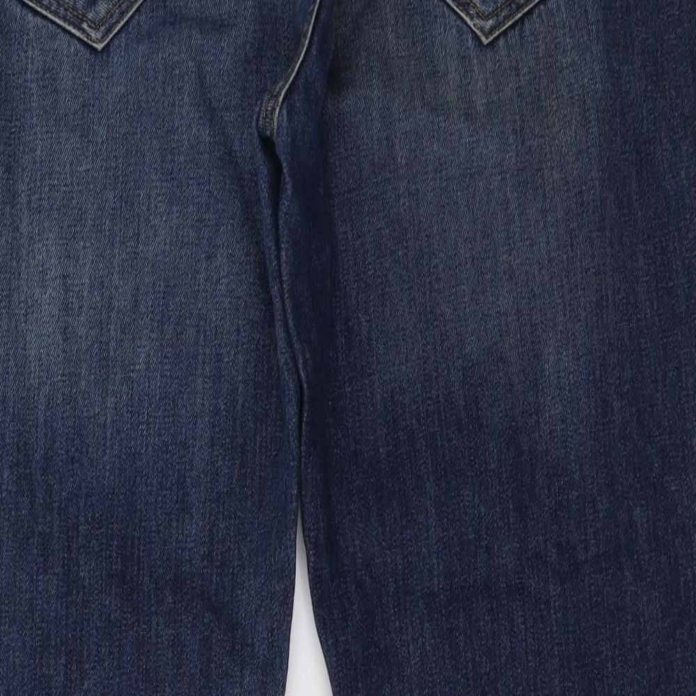 Brand and care label for Burton women’s blue denim straight jeans, size UK 36, 32-inch leg