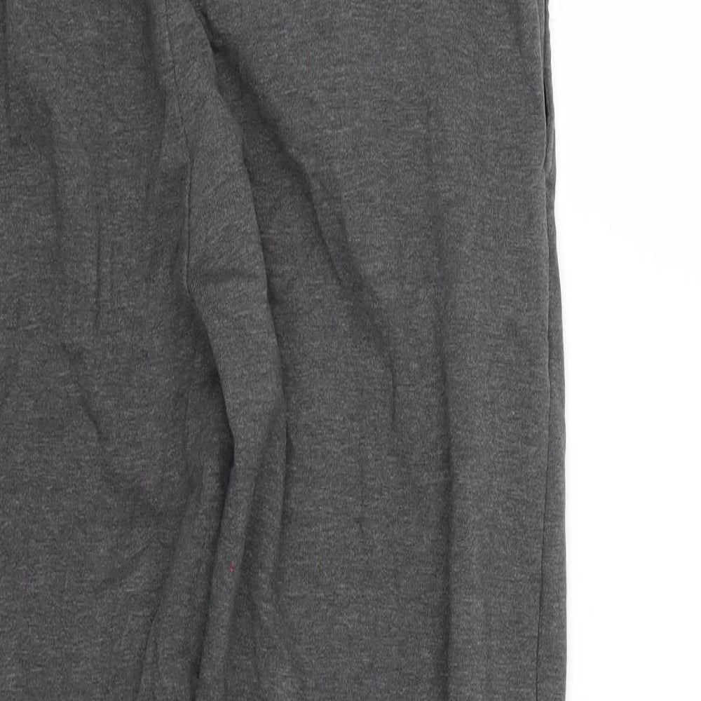 Brand and care label for Marks & Spencer men’s grey jogger trousers, size M, 26-inch leg