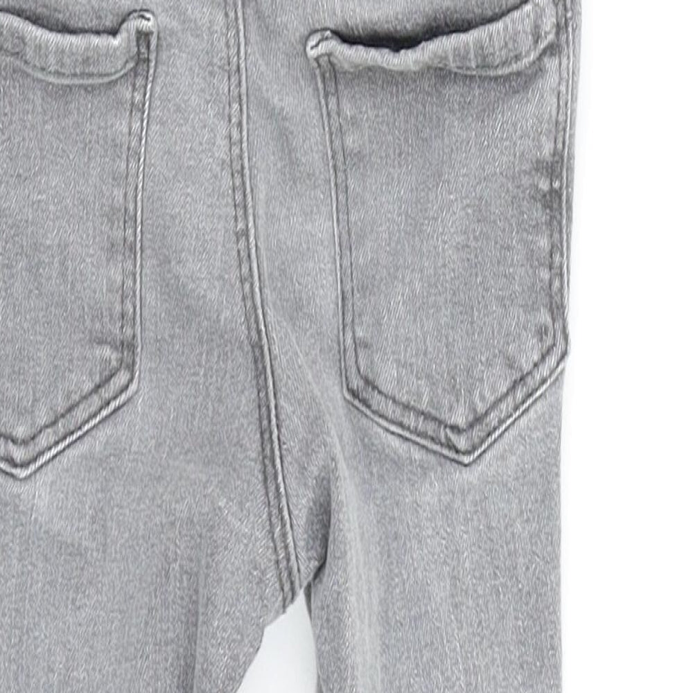 Brand and care label for H&M boys’ grey cargo jeans, size 24, months
