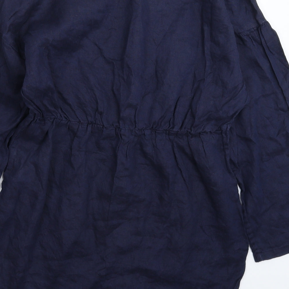 Brand and care label for Uniqlo women’s blue mini, size XS