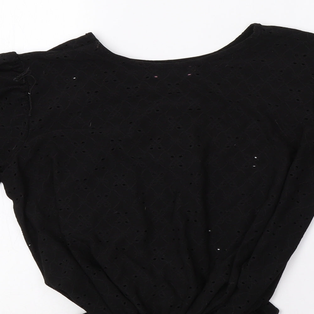 Brand and care label for Pretty Hurts women’s black floral basic blouse, size UK 12