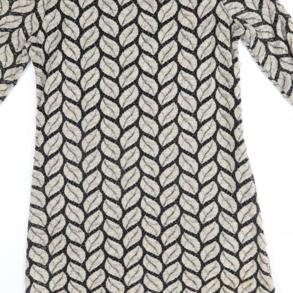 Brand and care label for Stella women’s beige floral jumper dress, size M