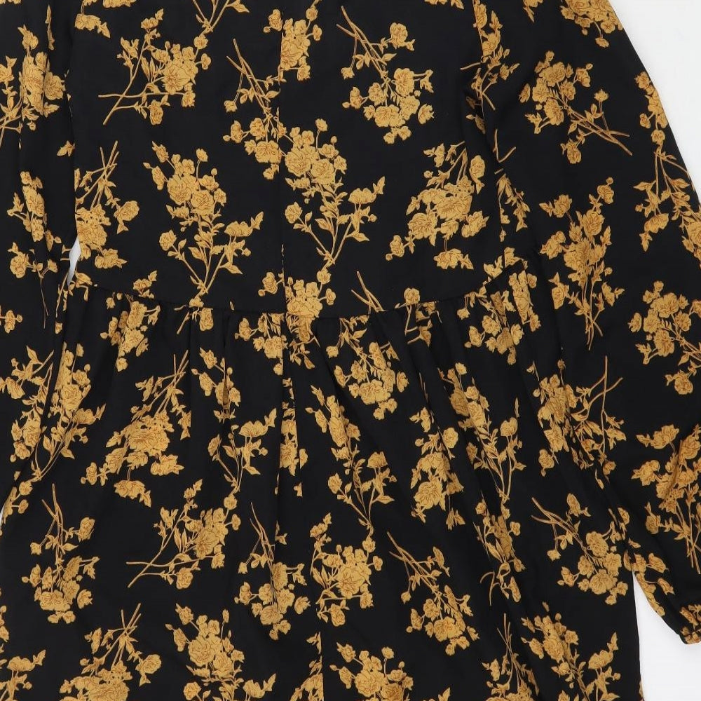 Brand and care label for SHEIN women’s black floral mini, size S