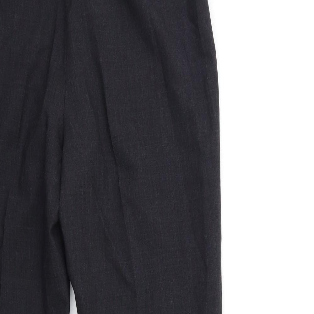 Brand and care label for Uniform Experiment women’s black trousers, size UK 10, 27-inch leg