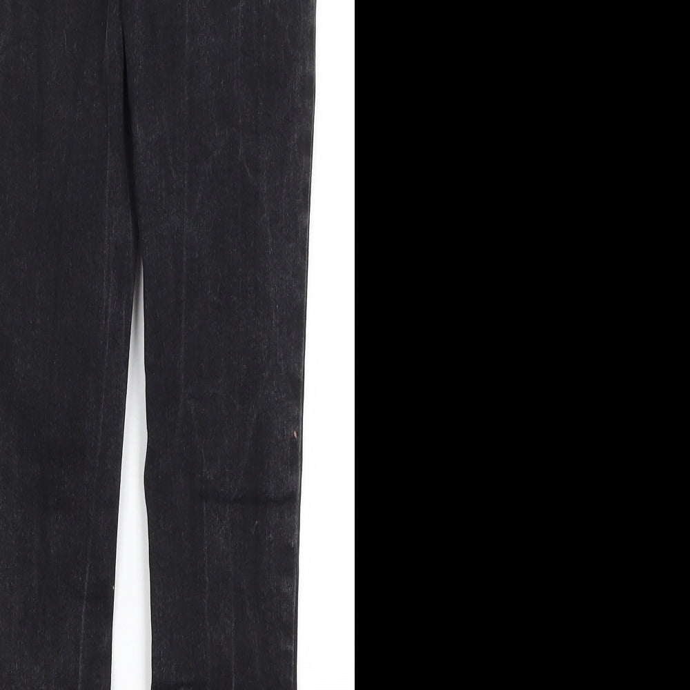Brand and care label for Next girls’ black skinny jeans, size 9, months