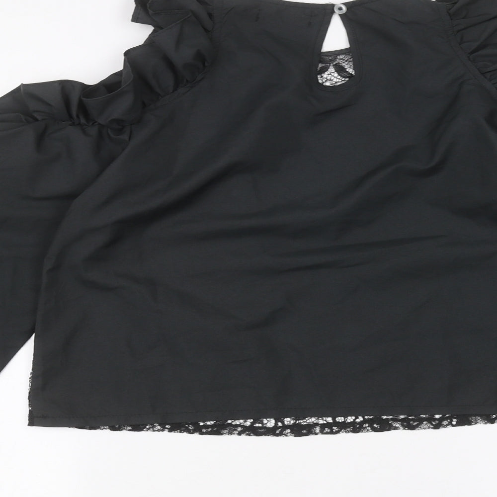 Brand and care label for Boohoo women’s black basic t-shirt, size UK 8