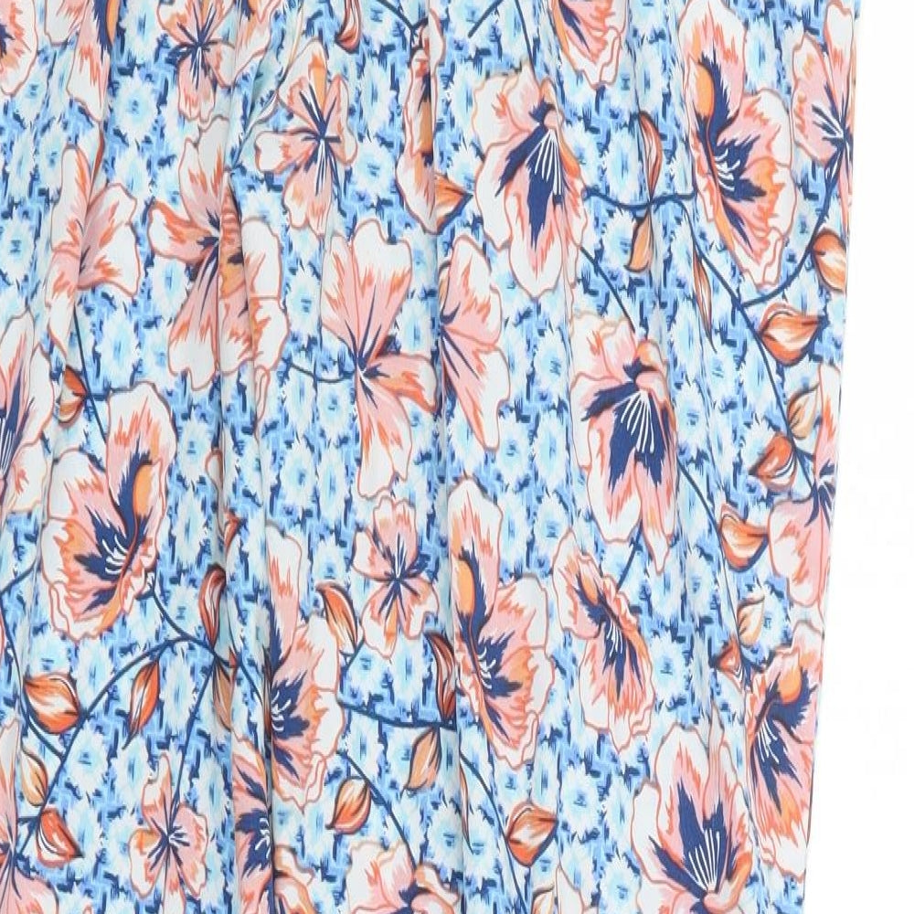 Brand and care label for Peacocks women’s blue floral trousers, size UK 12, 27-inch leg