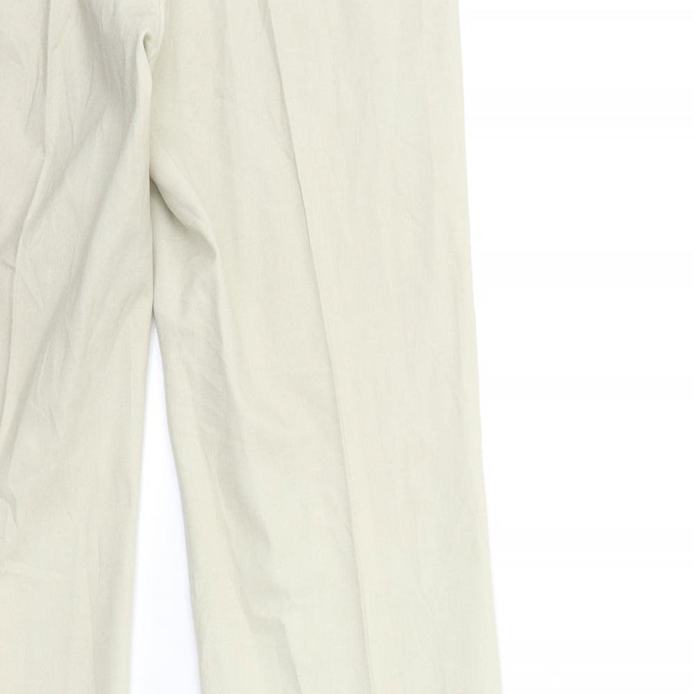 Brand and care label for STOOTOP women’s beige trousers, size UK 28, in, 30-inch leg