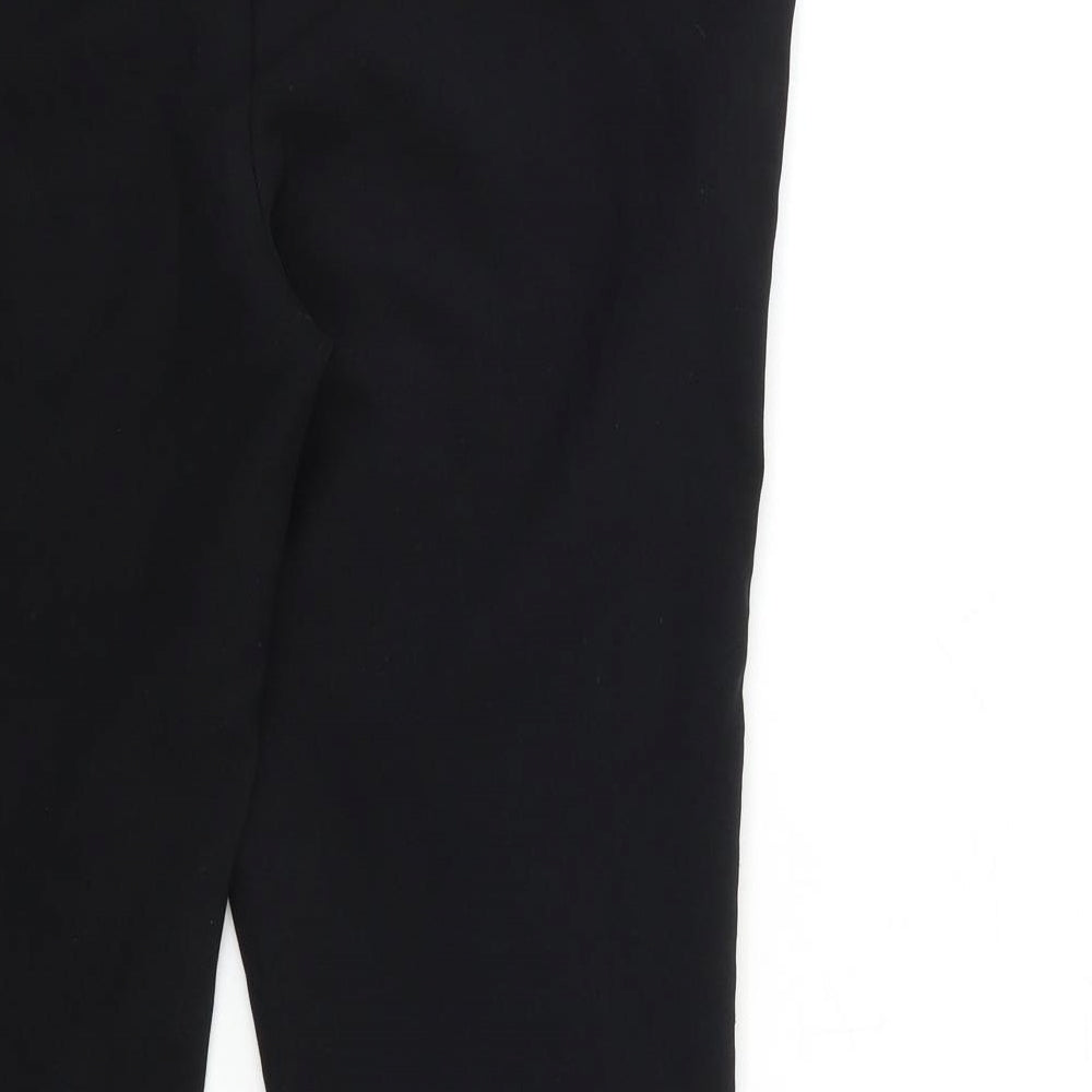 Brand and care label for Primark women’s black snow pants trousers, size UK 10, 27-inch leg
