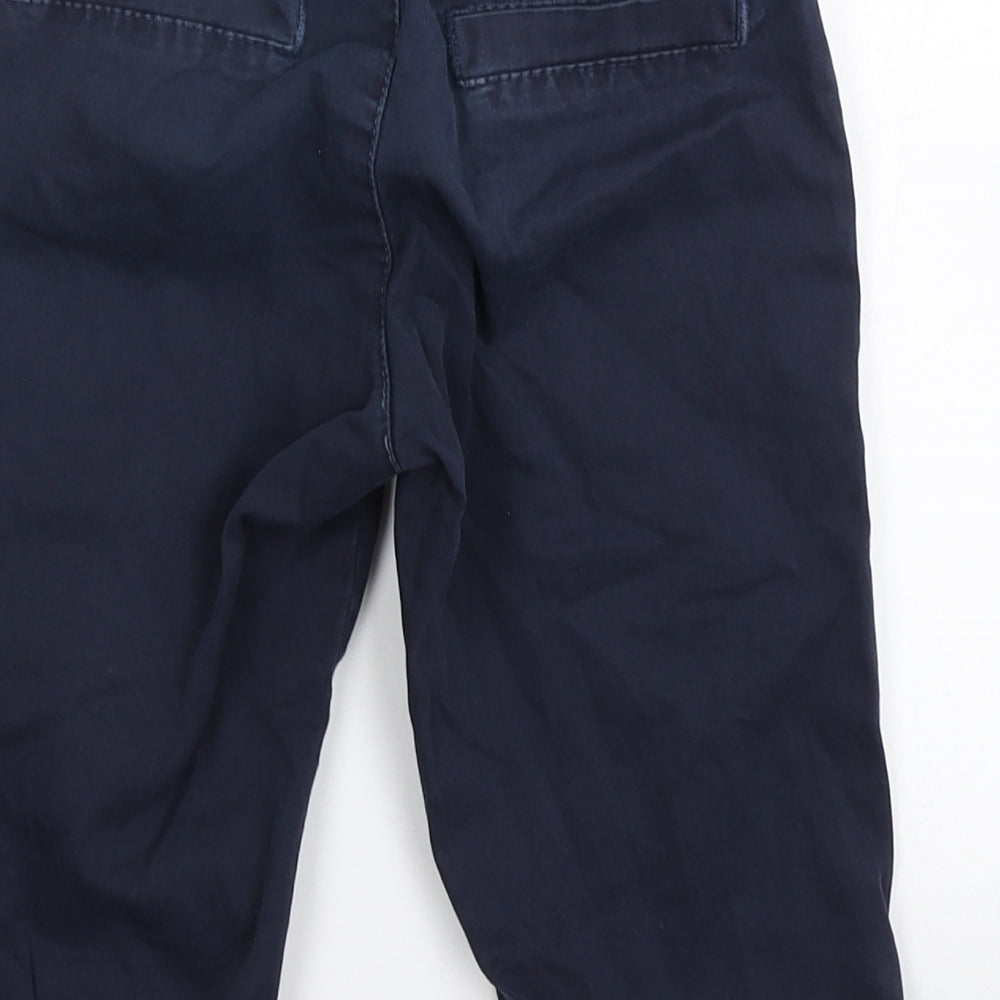 Brand and care label for Ronny Boy boys’ blue cargo trousers, size 6, years