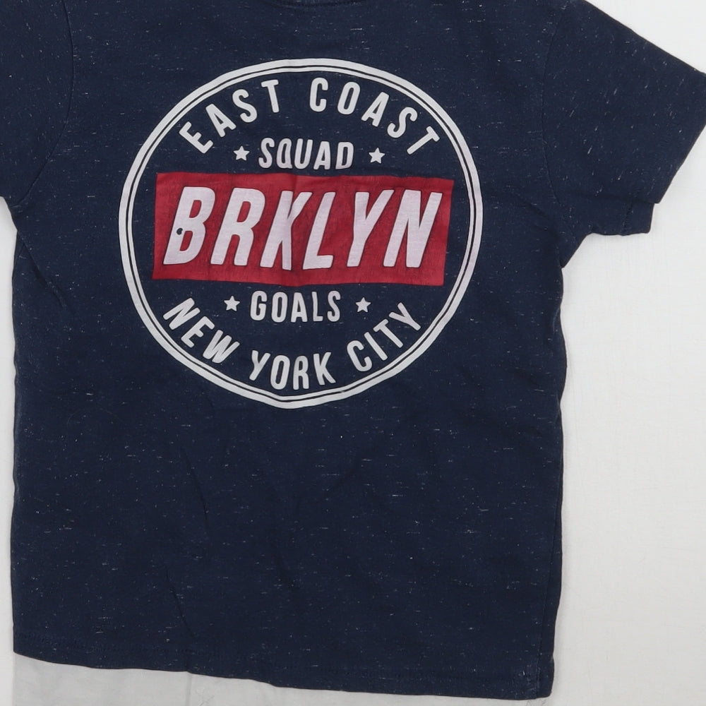 Brand and care label for Primark boys’ blue basic t-shirt, size 5-6, years