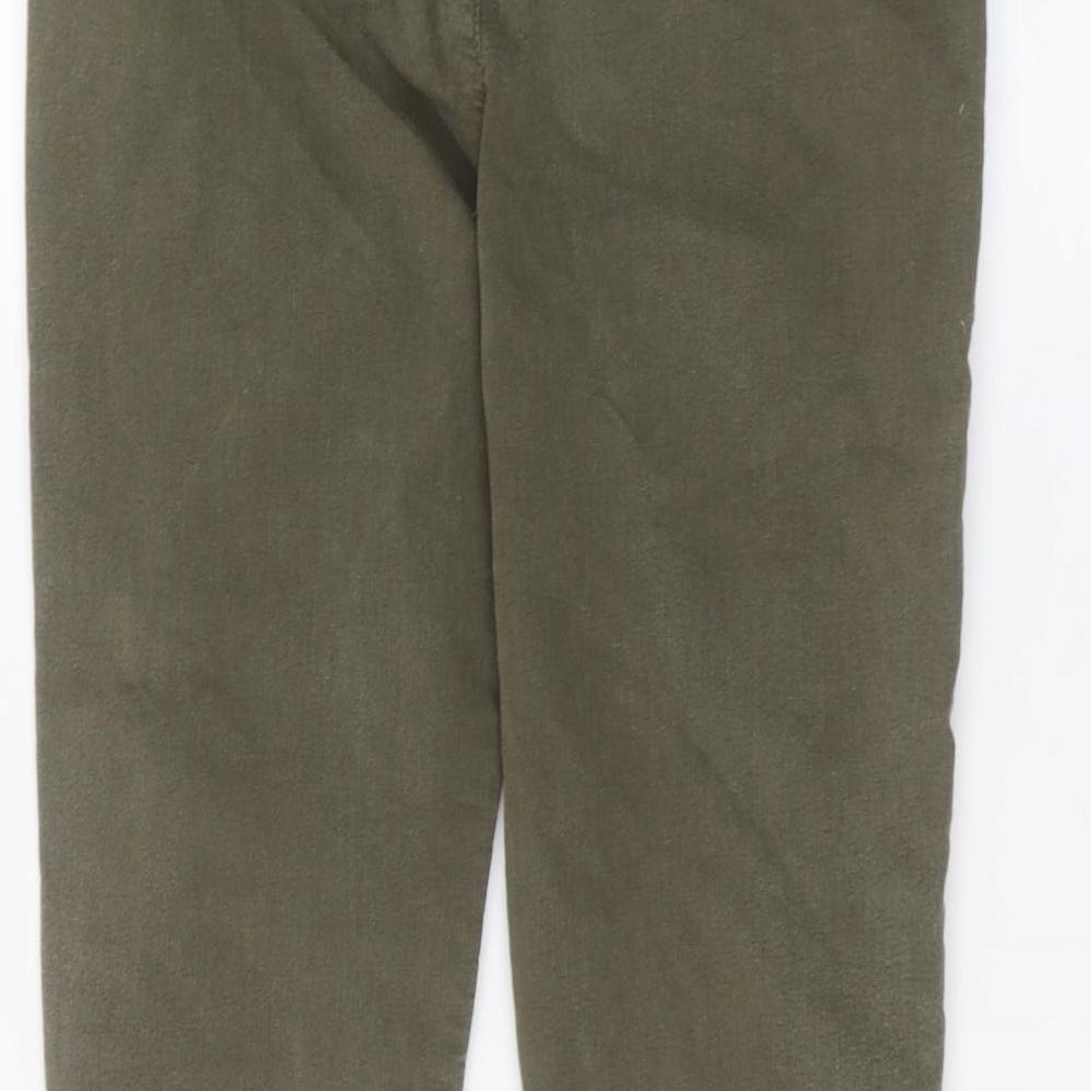 Brand and care label for Miss Selfridge women’s green skinny jeans, size UK 10, 27-inch leg