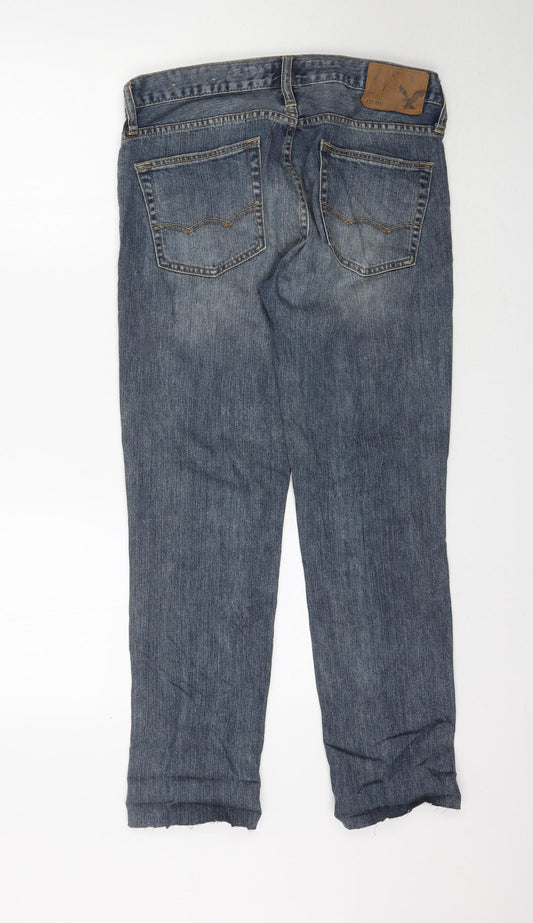 Back view of American Eagle women’s blue denim skinny jeans, size UK 30, 29-inch leg - raw hem