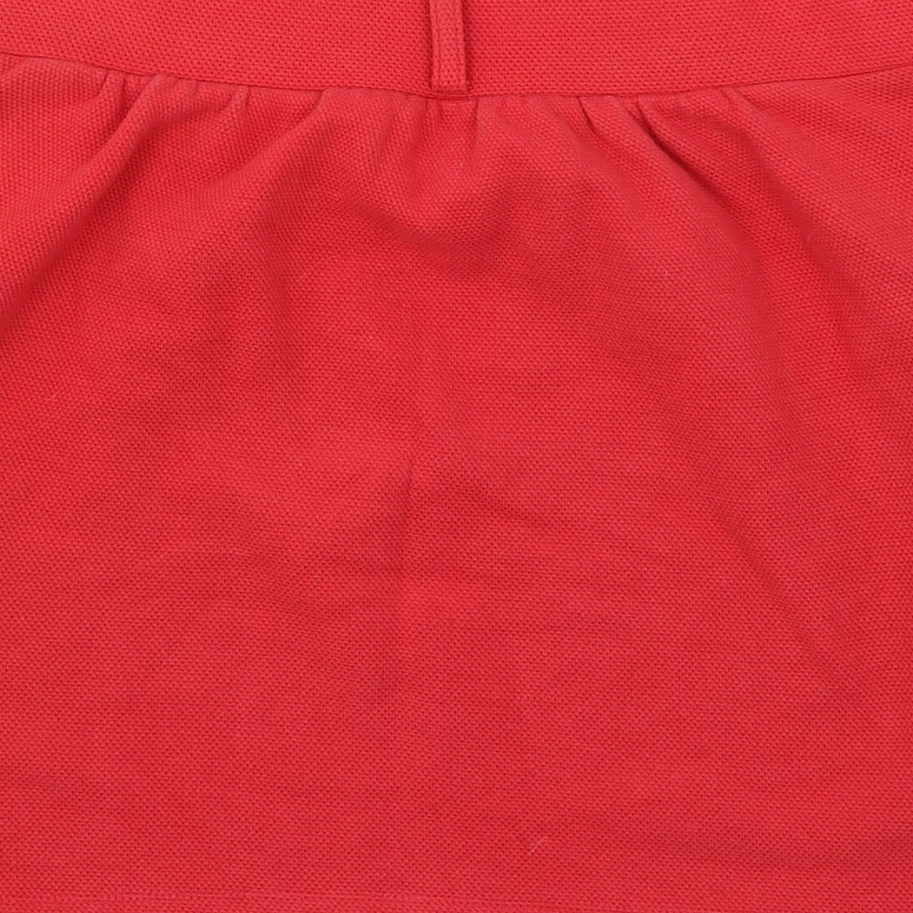 Brand and care label for H&M women’s red jersey a-line skirt, size L