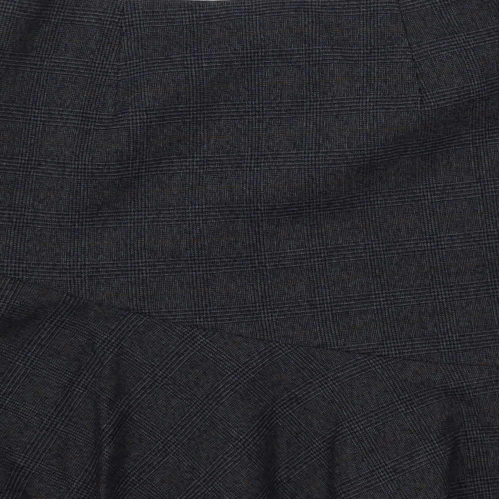 Brand and care label for Marks & Spencer women’s blue plaid flare skirt, size UK 28, in