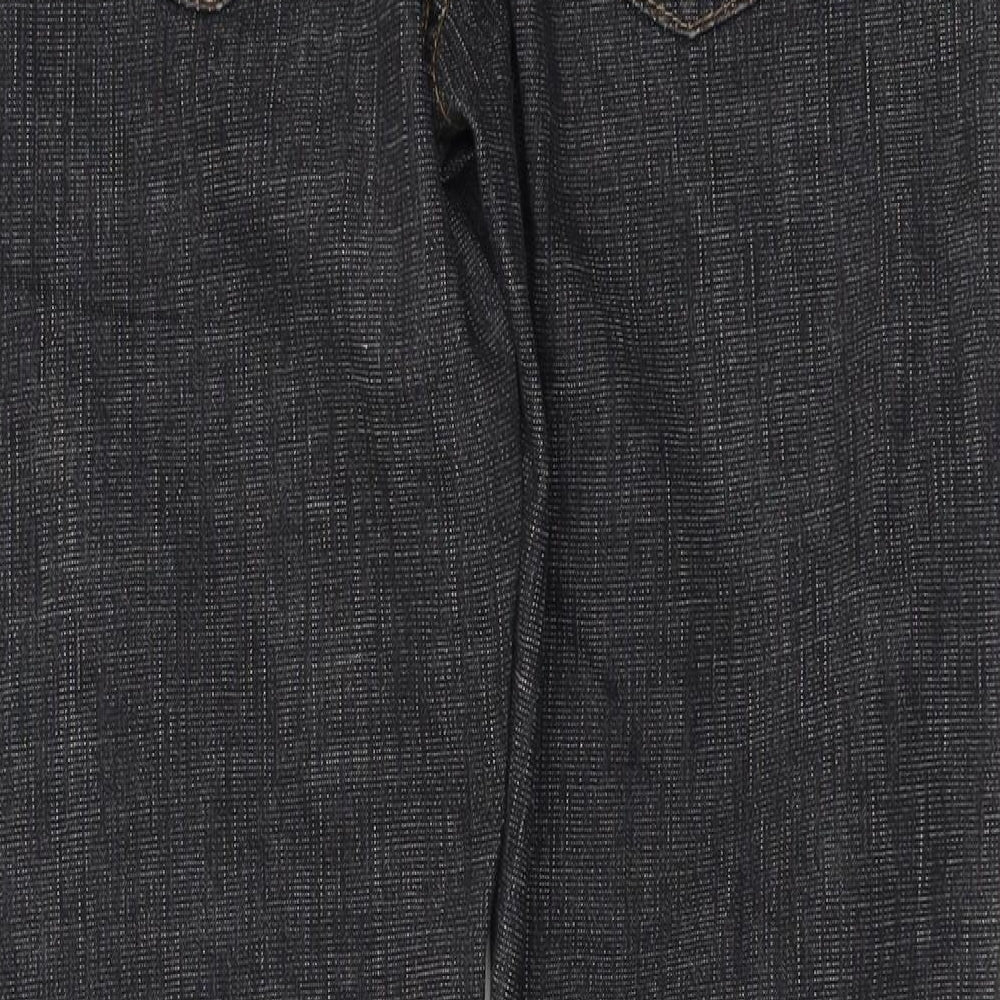 Brand and care label for Miss Selfridge women’s black straight jeans, size UK 32, 27-inch leg