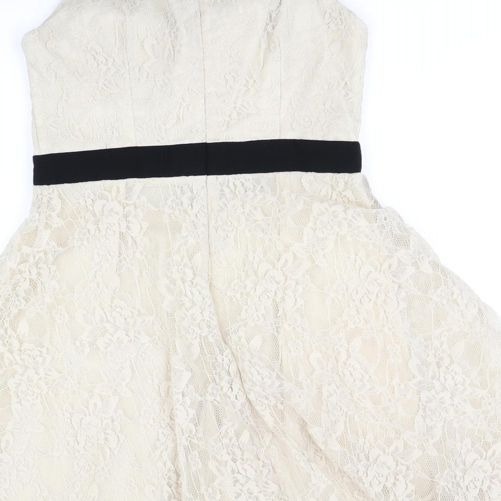 Brand and care label for Little Mistress women’s beige fit & flare, size UK 10