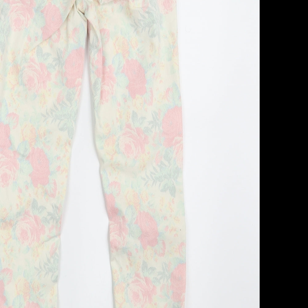 Brand and care label for Topshop women’s ivory floral denim skinny jeans, size UK 25, in, 32-inch leg