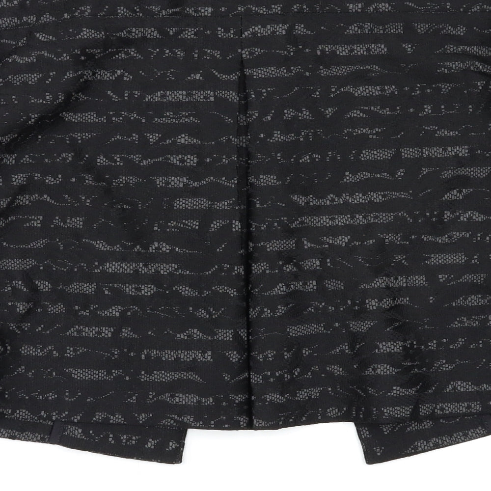 Brand and care label for NAF NAF women’s black jacket, size UK 6